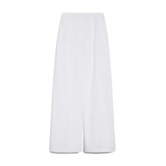 Pantalone GEBE, di Sportmax, da donna, colore bianco. Modello dal volume oversize, realizzato in tela di cotone lavata per una mano consistente e fluida. La costruzione è a vita basa, con passanti in vita, tasche oblique sui fianchi e applicate 